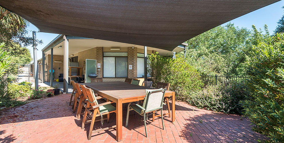 Patio under cover near greenery