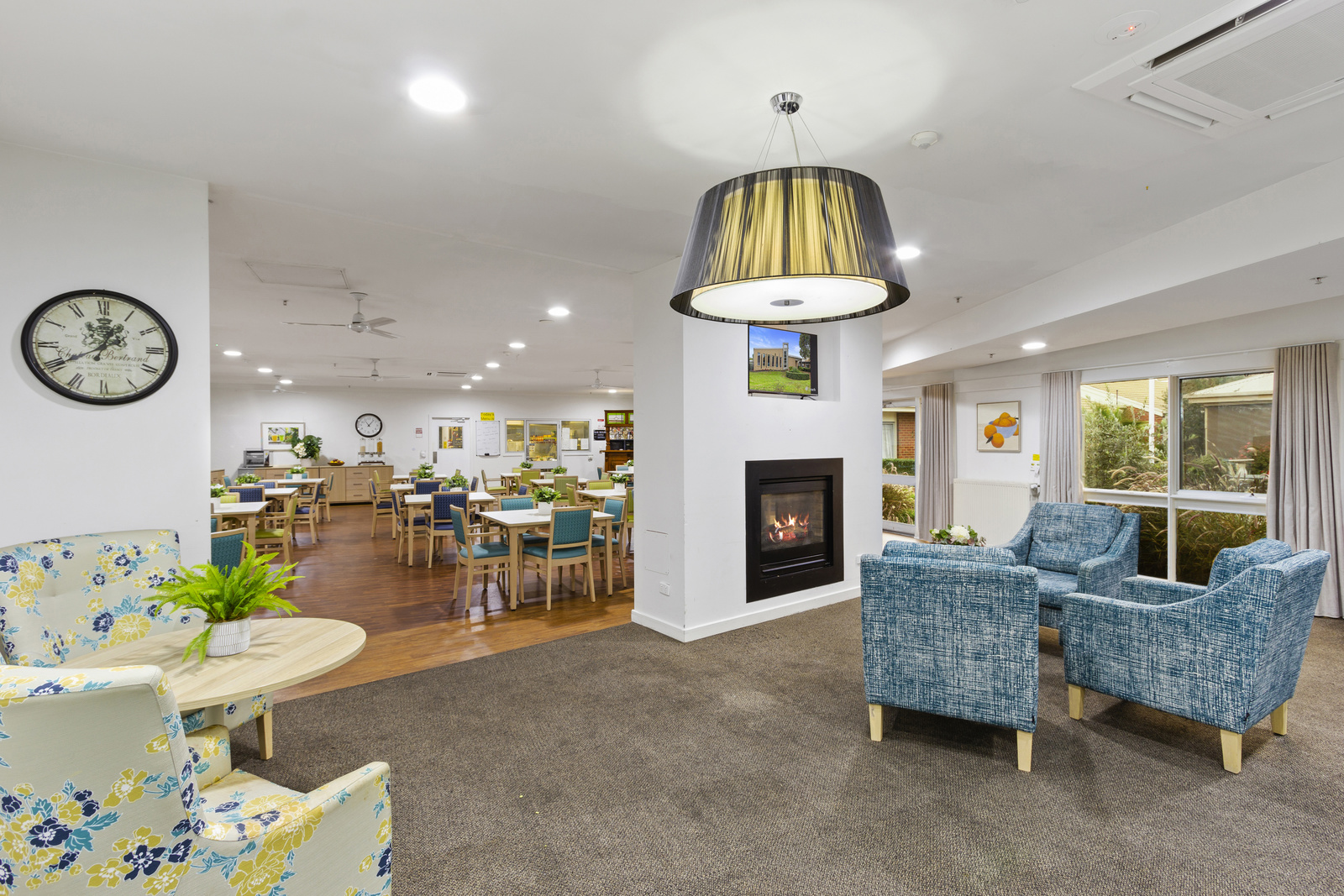 Open living room with view of the dining room