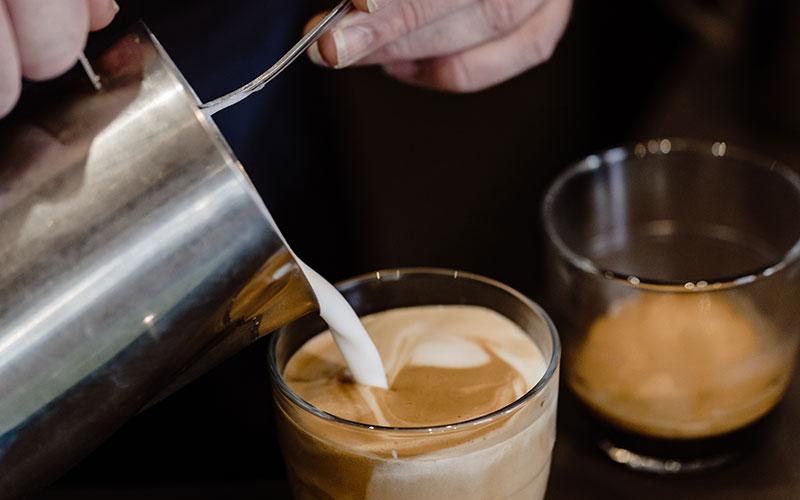 Photo of someone making coffee