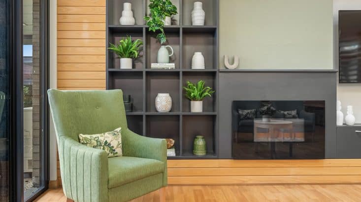 Berwick Aged Care foyer with green armchair and fireplace