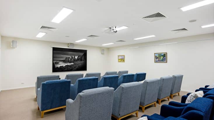 Cinema room with blue seating