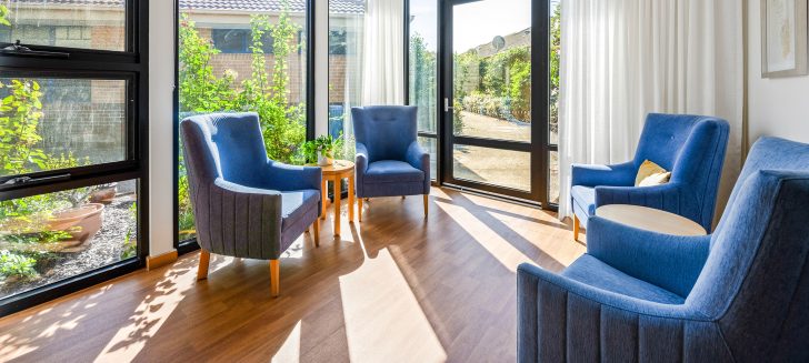 Berwick Aged Care sitting room with wide windows and armchairs.
