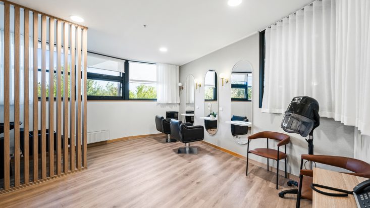 Berwick Aged Care salon with large mirrors and bright lights.