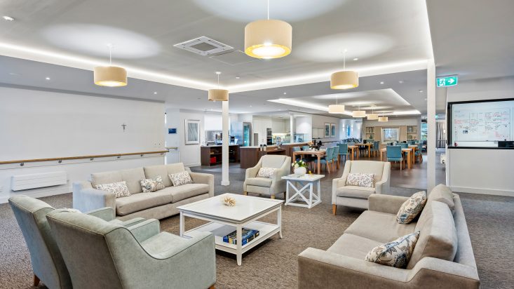 A living space with a large coffee table.
