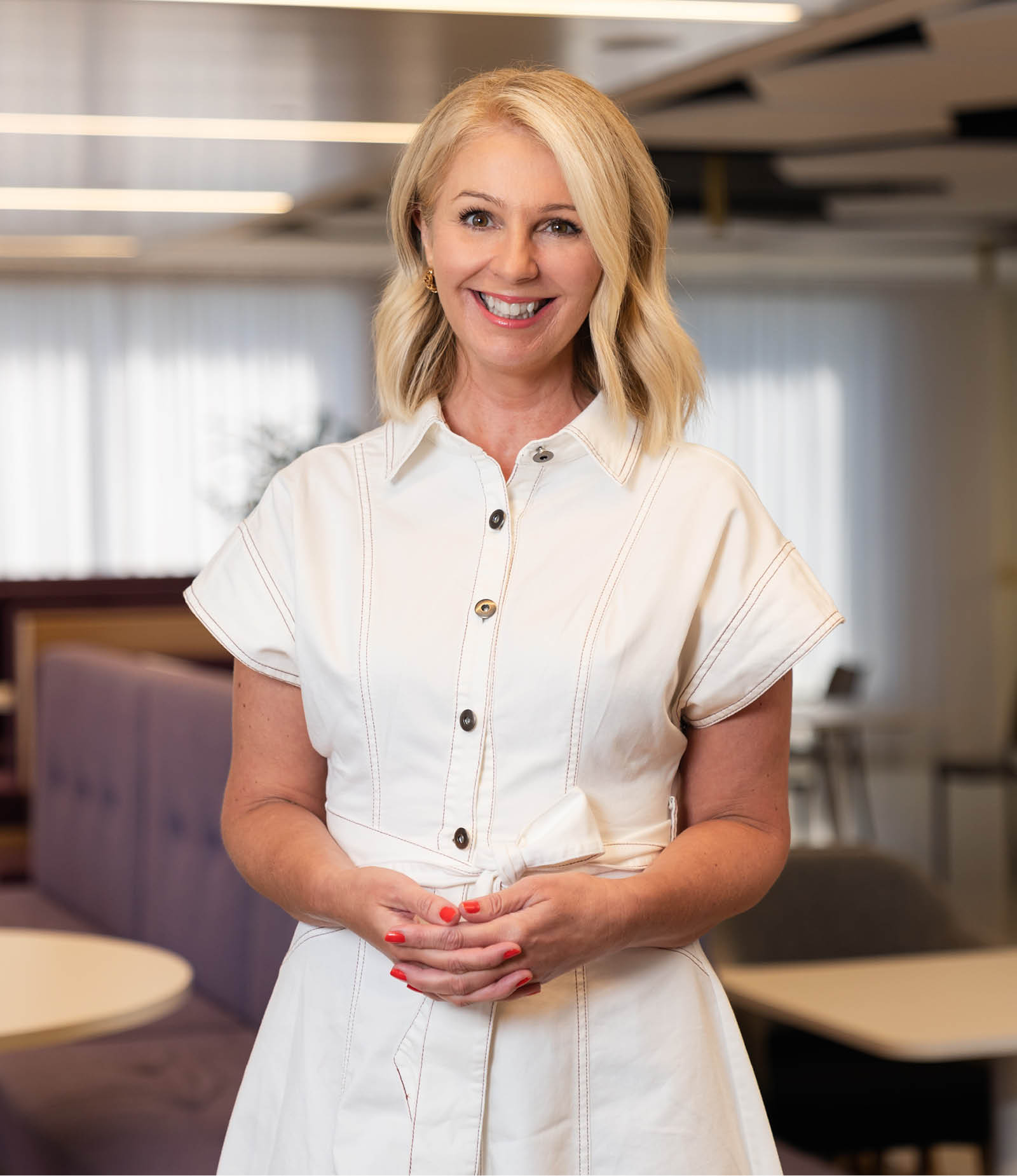 Woman with blonde hair smiling
