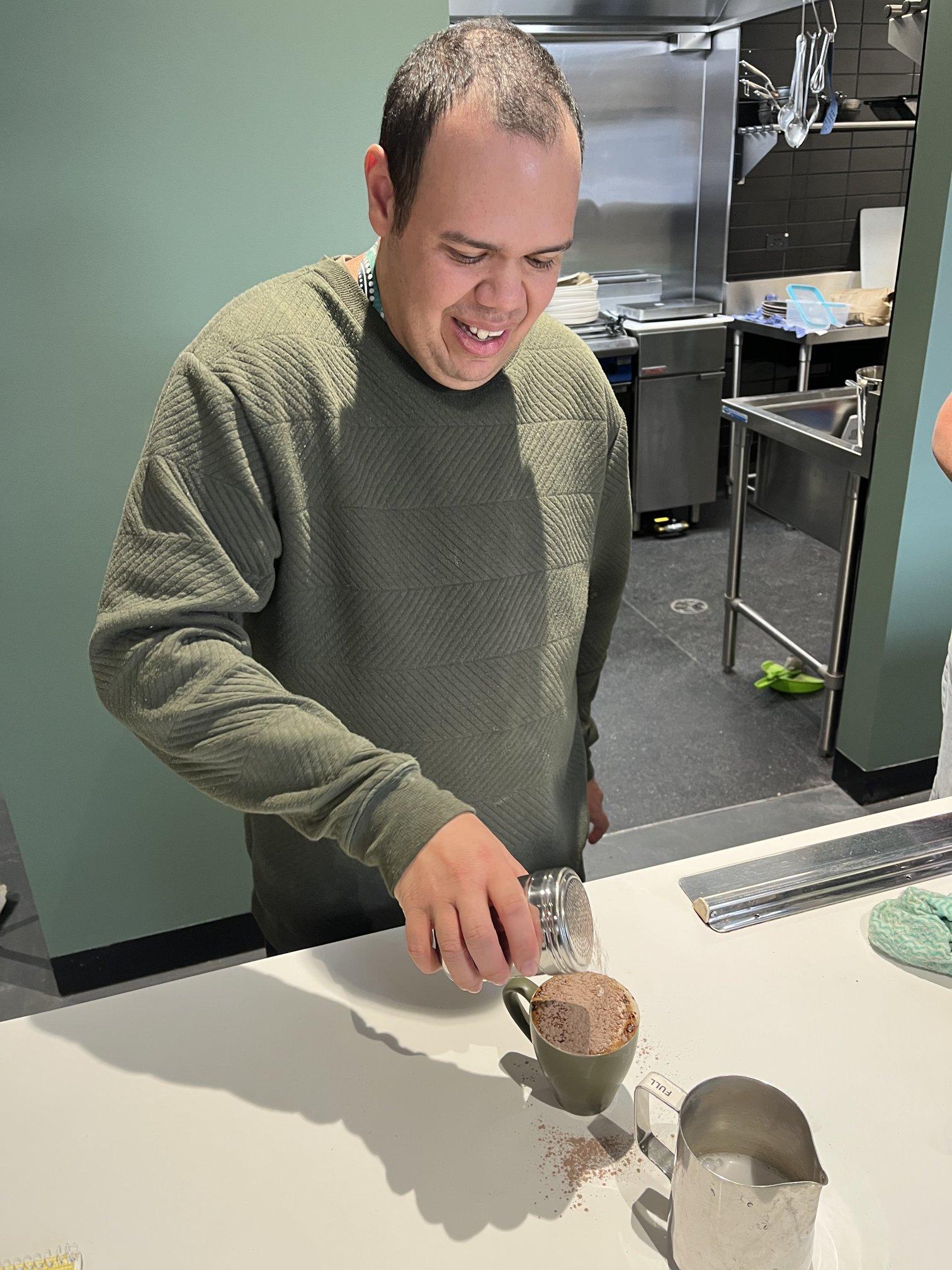 Craig perfects a cappuccino