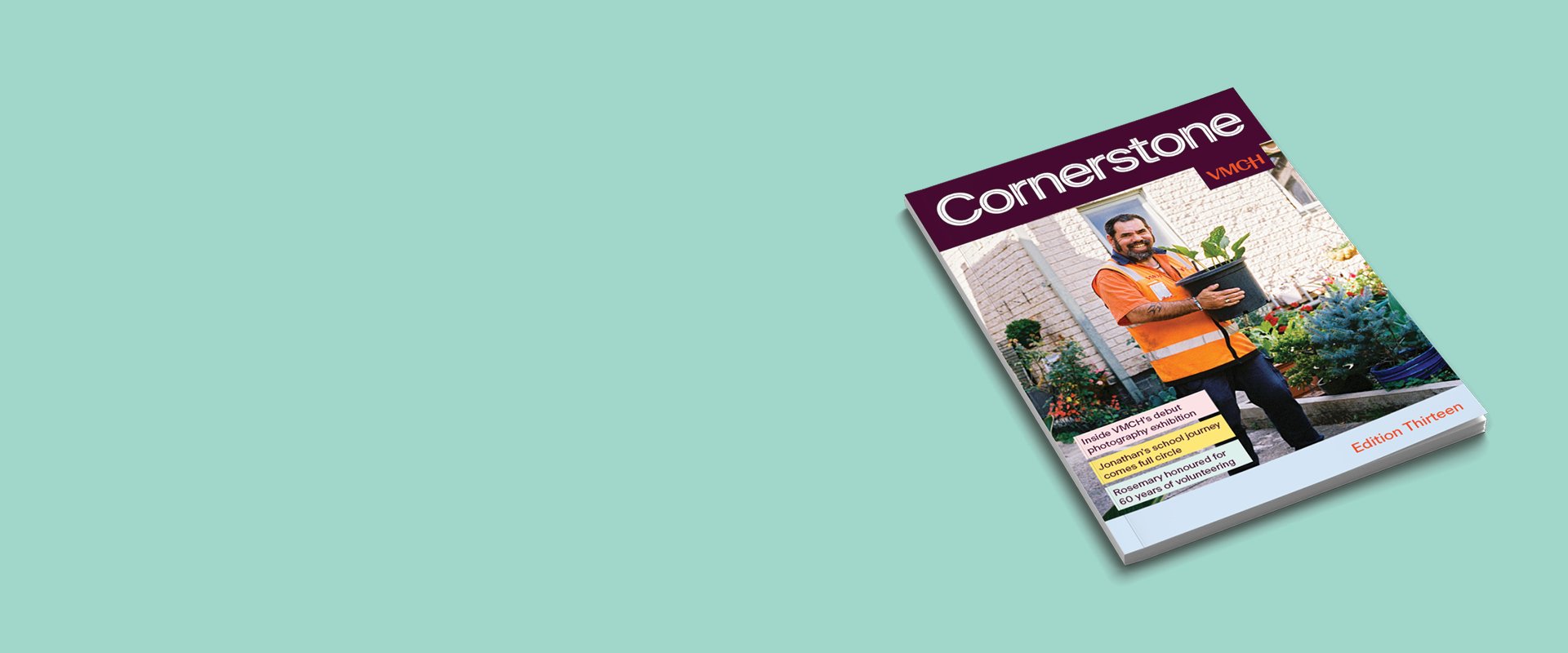 VMCH Cornerstone magazine Edition Thirteen displayed on a teal background, featuring a man in an orange vest holding a potted plant on the cover.